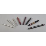 A collection of fountain and ball point pens, to include Wahl Oxford, Parker and Rotring examples.
