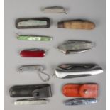 Ten pocket knives. Includes Richards, Hi Gear, etc.