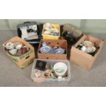 Five boxes of miscellaneous and two sewing machines. Mostly ceramics and glassware including