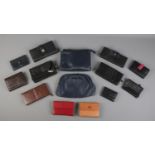 A collection of purses, wallets and clutch bags.