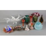 A collection of coloured art glass to include several vases, large decorative bowl, carnival