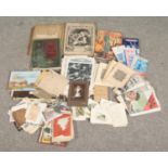 A box of mixed ephemera. Includes Victorian scrap books, German Composers book, coloured plates of