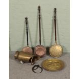 A collection of metal wares to include assorted pewter, copper bed pans, brass coal scuttle, etc.