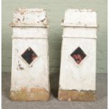 A pair of garden chimney pots featuring diamond motif. Approx. height 66cm.