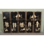 Five Asian carved mother of pearl and lacquer wall panels