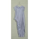 A John Bates for Jean Varon maxi-dress featuring ruffle collar and asymmetrical pleated drape