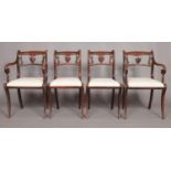 A set of eight Regency Trafalgar style dining chairs, including two carvers.