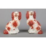 A pair of Victorian Staffordshire pottery Spaniels in red, size No. 2. Height 16cm. No cracks or