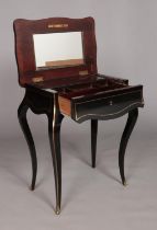 A French 19th century ebonised vanity table with brass inlaid decoration. Height 73.5cm, Width 60cm,