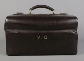 An early 20th century leather dressing case by Asprey, Bond Street. Monogrammed VD.