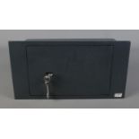 A steel underfloor/wall safe with five lever security lock and two keys