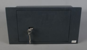 A steel underfloor/wall safe with five lever security lock and two keys