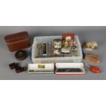 A tray of assorted collectables to include boxed glass nasal douche, travel vanity set,