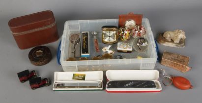 A tray of assorted collectables to include boxed glass nasal douche, travel vanity set,