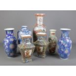 A good collection of large oriental vases. Includes two pairs, one with character marks to base.