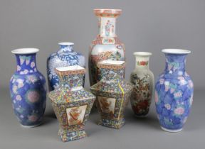 A good collection of large oriental vases. Includes two pairs, one with character marks to base.