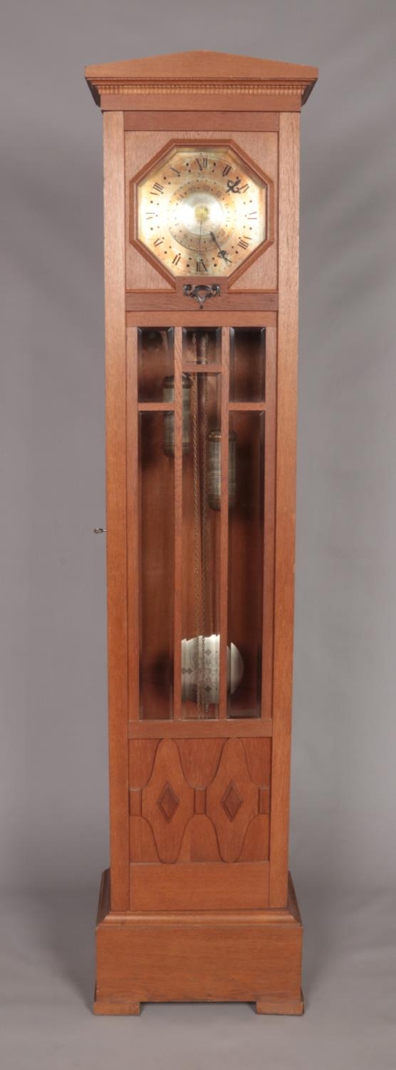 A German carved oak longcase clock with Kaiser gong, marked DRPa. Height 211cm. Not running
