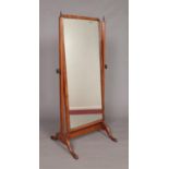 An Edwardian walnut cheval mirror. Height 151.5cm, Width 71cm.