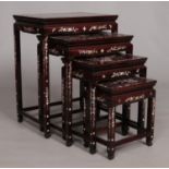 A quartetto of Oriental nesting tables with mother of pearl inlaid decoration. Biggest table -