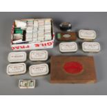 A collection of smoking related items to include Ogden's tobacco tins, large collection of