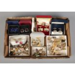 A tray of assorted cufflinks and tie slides to include Stratton, Atlas Edition, commemorative and