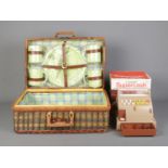 A wicker picnic hamper and contents, together with a boxed Casdon Supercash child's till, with