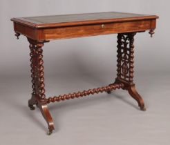 A Victorian rosewood writing table. Having leather inset top, single drawer and barley twist
