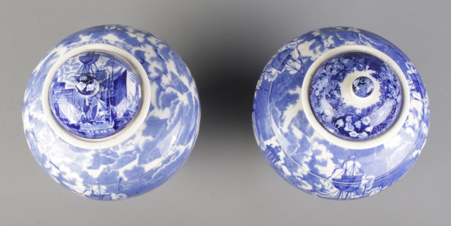 A large pair of late 19th/early 20th century Wedgwood blue and white lidded vases decorated in the - Image 2 of 3