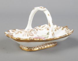 An early 19th century Spode miniature porcelain basket, pattern 3979. Circa 1820. Length 10.3cm.