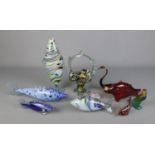 A quantity of Murano glass style fish along with other glass examples and a glass swan and novelty