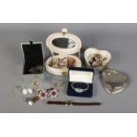 A collection of jewellery boxes with contents of costume jewellery. Also include Raymond Weil 18K