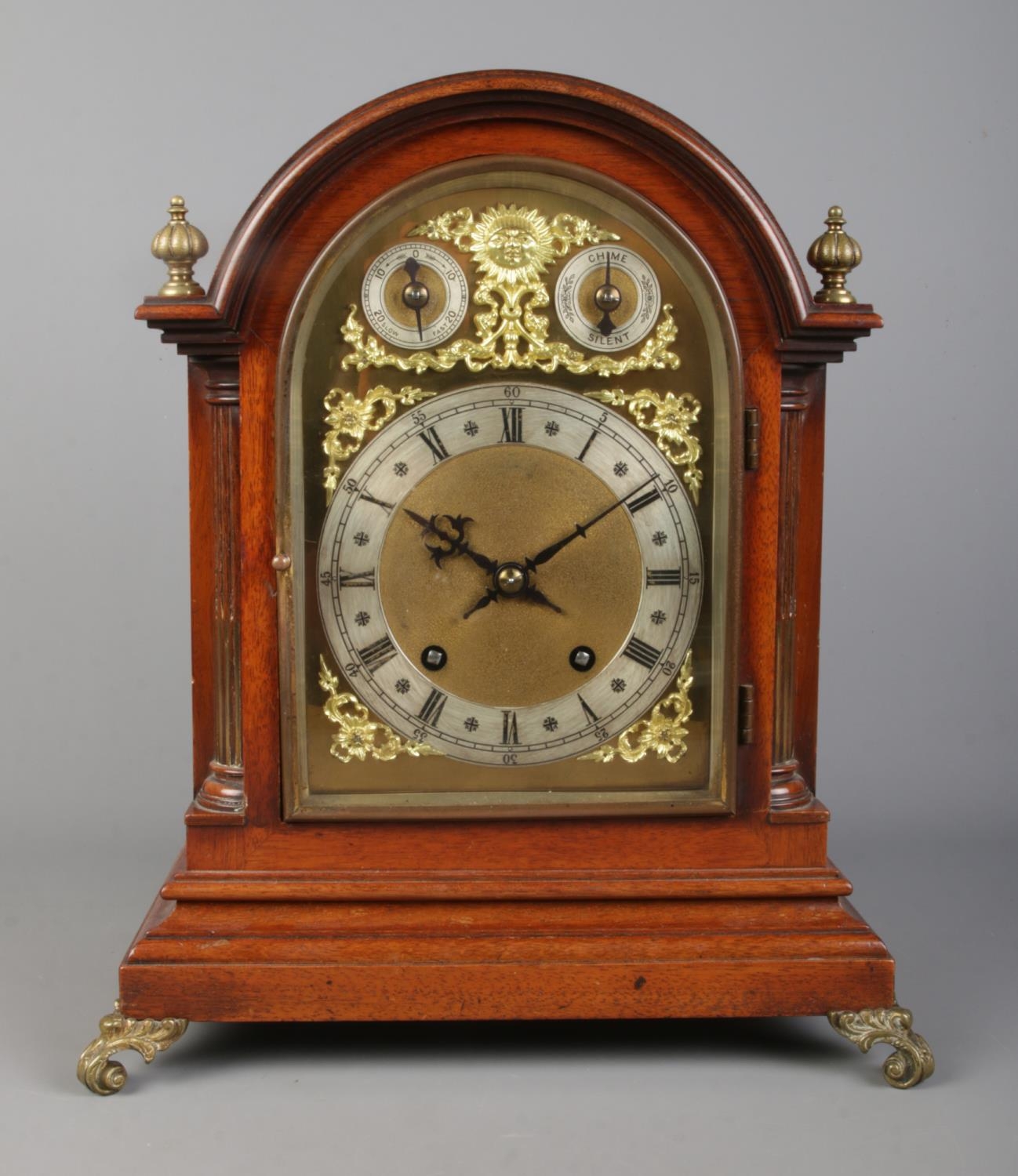 An early 20th century mahogany dome top bracket clock by Winterhalder & Hofmeier. Having brass