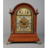 An early 20th century mahogany dome top bracket clock by Winterhalder & Hofmeier. Having brass