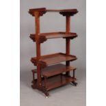 A Victorian carved mahogany five tier Etagere. Height 136cm, Width 69cm, Depth 45cm.