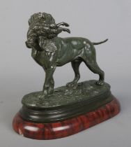Edouard Paul Delabrierre (1829-1912), a bronze sculpture depicting a hunting dog with game bird in