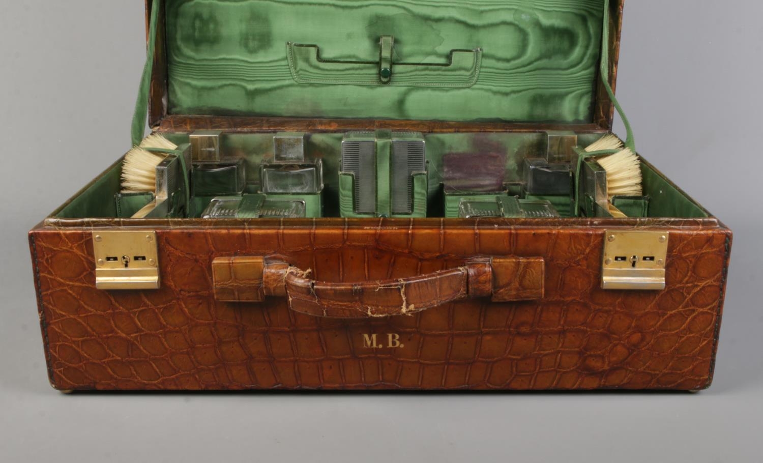 A crocodile skin dressing case by JW Robinson & Co, Los Angeles, with fitted interior and contents - Image 2 of 6