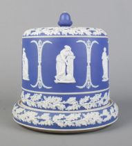 A large 19th century Jasperware cheese dome. Having acorn finial and decorated with classical figure
