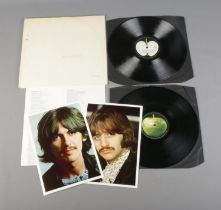 The Beatles White Album No. 0313402 top opening stereo pressing. Includes original poster and two of