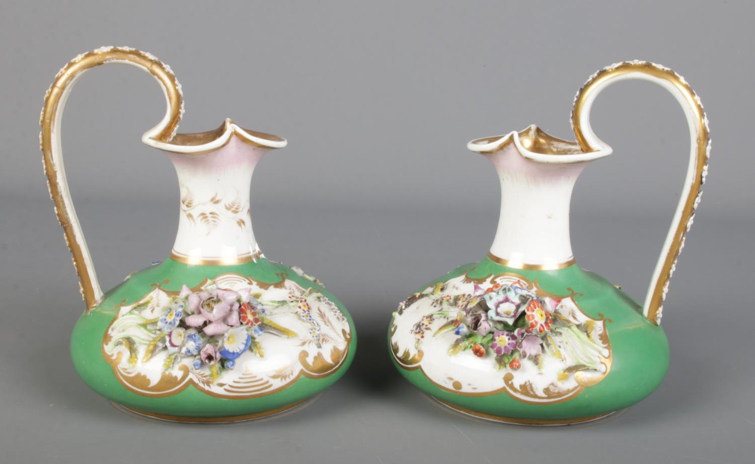 A pair of 19th century Derby Bloor ewers, green ground with applied flowers and gilt decoration. - Image 2 of 3