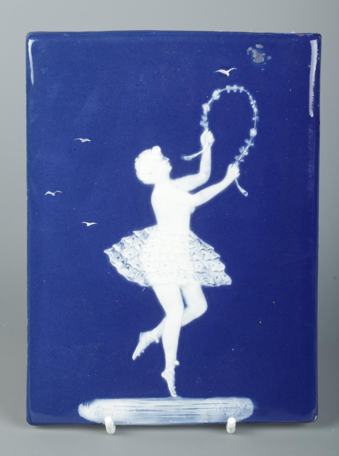 A Limoges Pate-Sur-Pate plaque depicting a dancer, signed Marcel Chaufriasse. 19cm x 14cm.