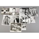 A quantity of monochrome photographs and film stills, some signed. Autographed Dean Martin, The