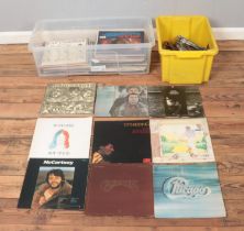 A box of assorted vinyl records and one box of singles, mainly pop and easy listening. To include