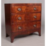 A Victorian mahogany chest of three drawers. Having satinwood cross banding. Height 90cm, Width 86.