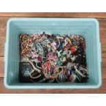 A large box of mixed costume jewellery, to include beaded necklaces, bracelets, bangles etc.