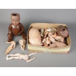 A box of porcelain doll parts to include Simon and Halbig doll stamped 117 to reverse.