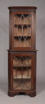 An Edwardian mahogany astragal glazed corner cupboard. Height 208cm, Width 74cm.