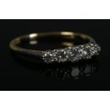 A 18ct Gold and Platinum five stone diamond ring. Size Q. Total weight: 2.2g