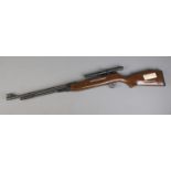 A Snowpeak .177 under lever action air rifle with scope. V475952. CAN NOT POST Cocks and fires.