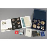 A quantity of coins. Includes large commemorative Queen Victoria example, British aircraft, Lest