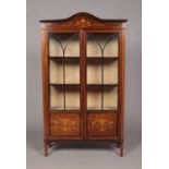 An Edwardian Sheraton Revival mahogany display cabinet. With astragal glazed door and painted